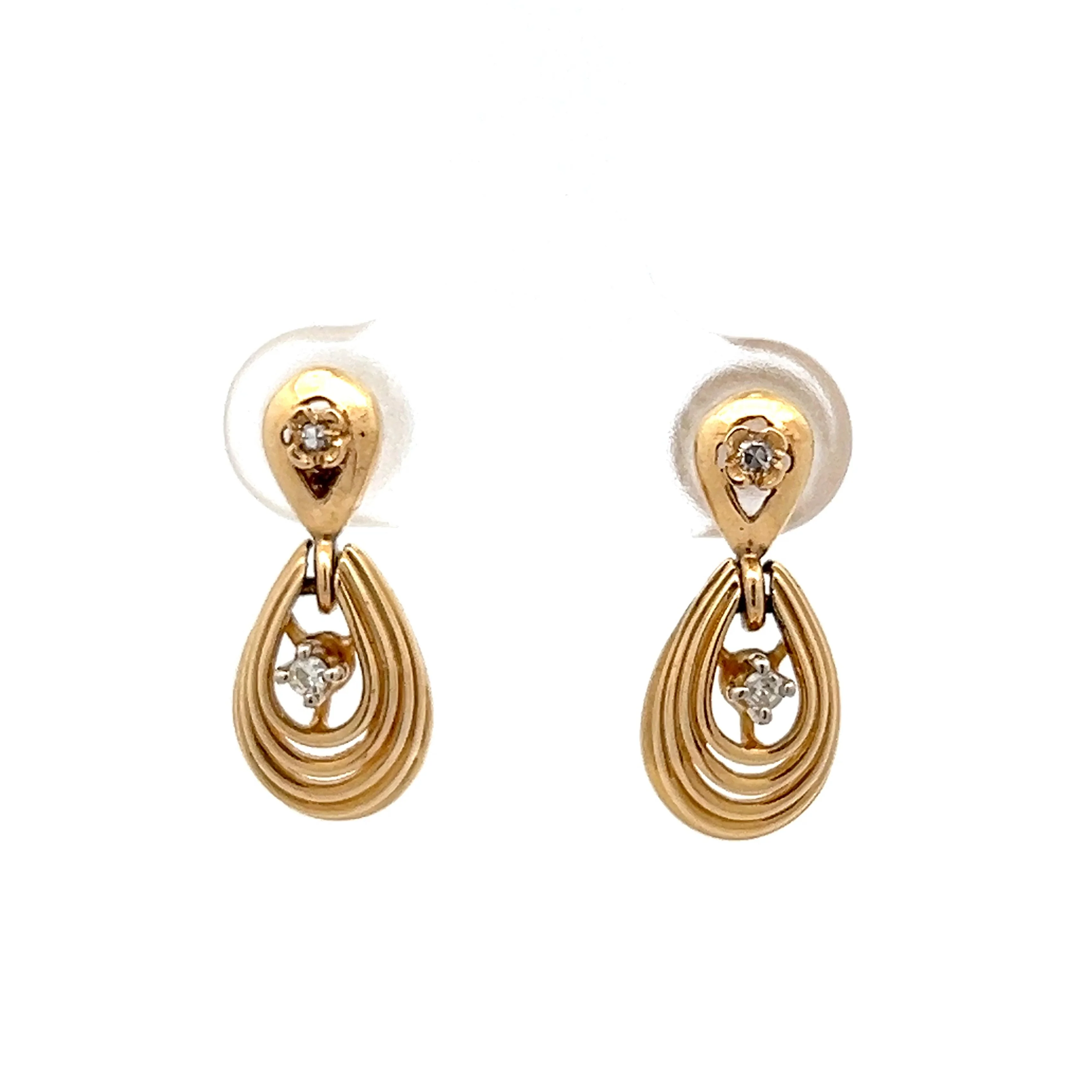 .05 Diamond Tear Drop Shaped Earrings in 14k