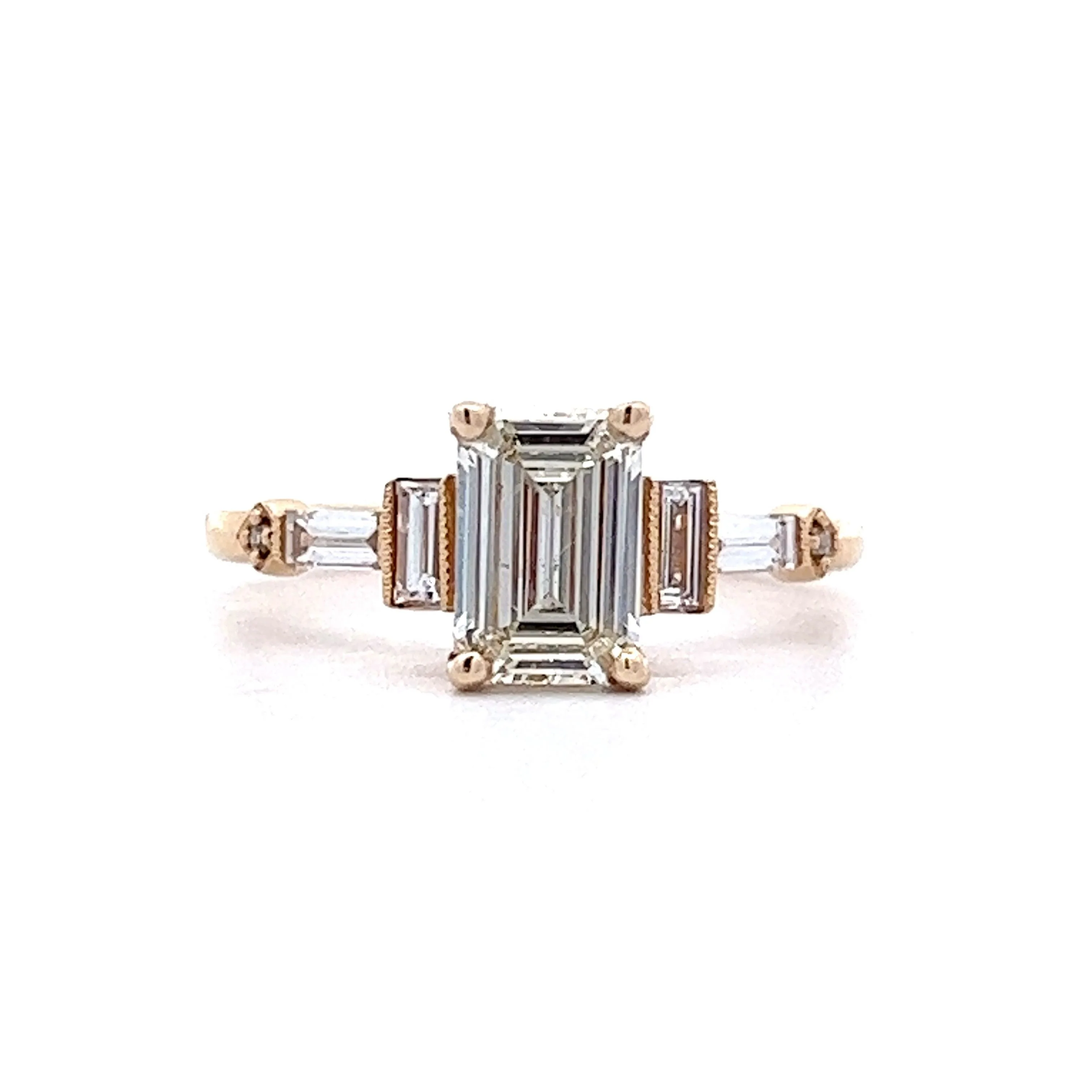 1.09 Emerald Cut Three Stone Engagement Ring in 14k Yellow Gold