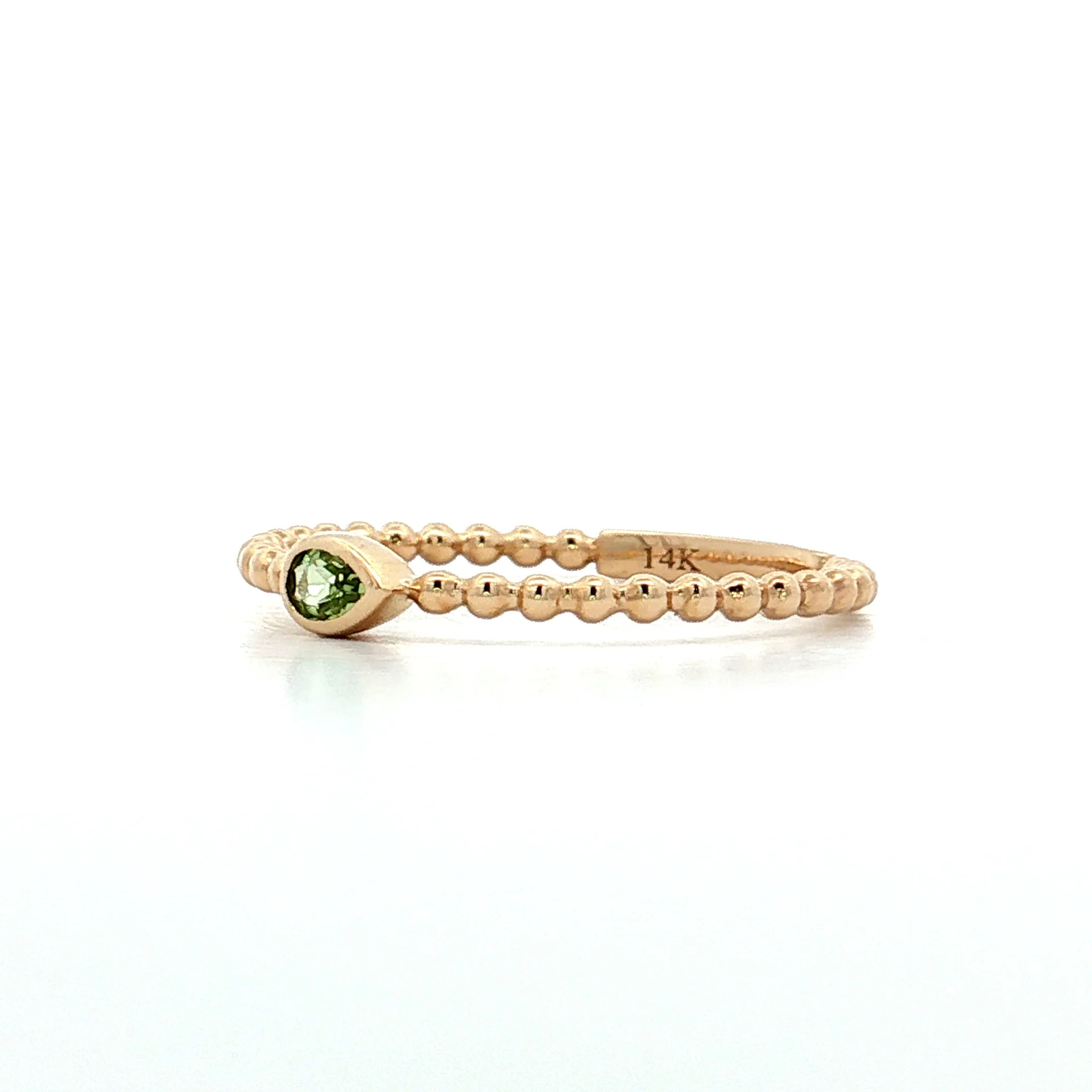 .10 Pear Cut Peridot Stacking Ring 14k Yellow Gold - Image 2