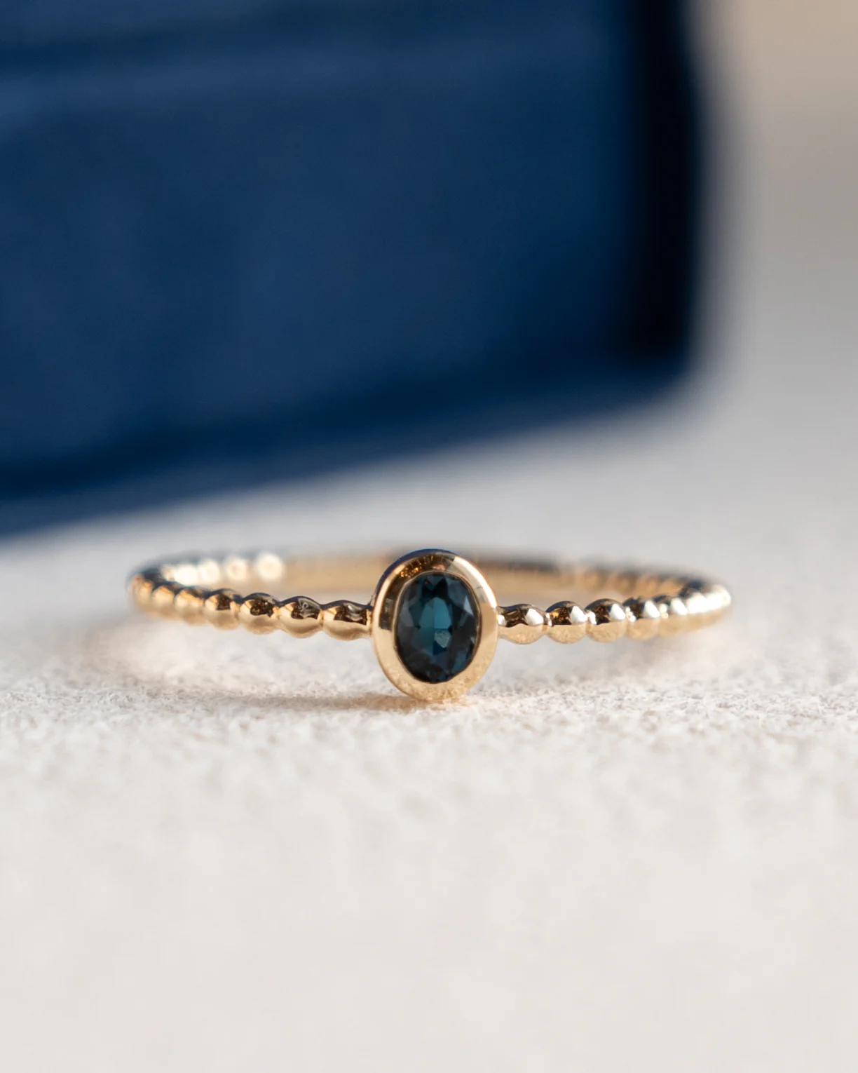.15 Oval Blue Topaz Stacking Ring 14k Yellow Gold - Image 6