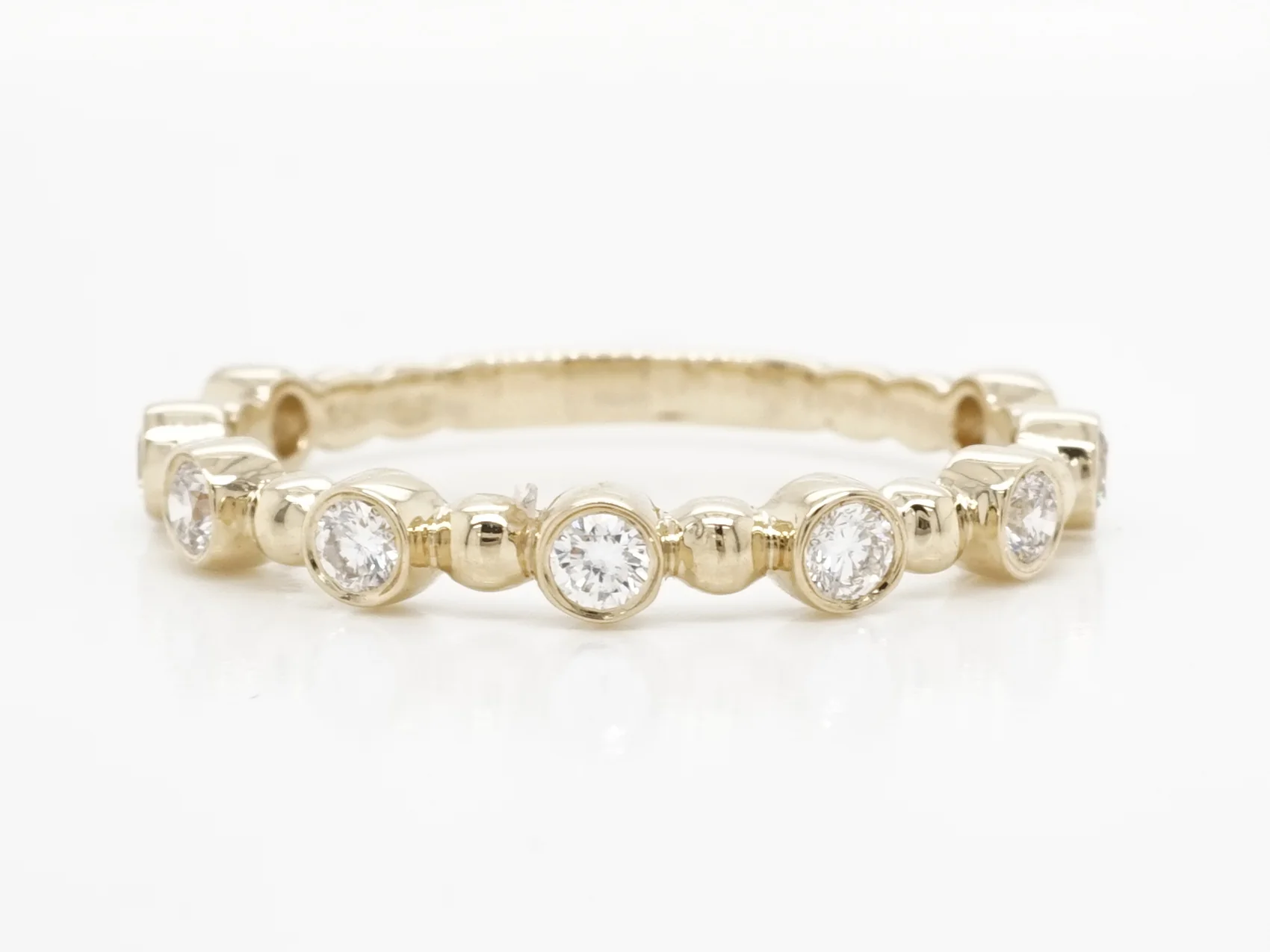 .27 Bezel Set Diamond Wedding Band in 14k Yellow Gold