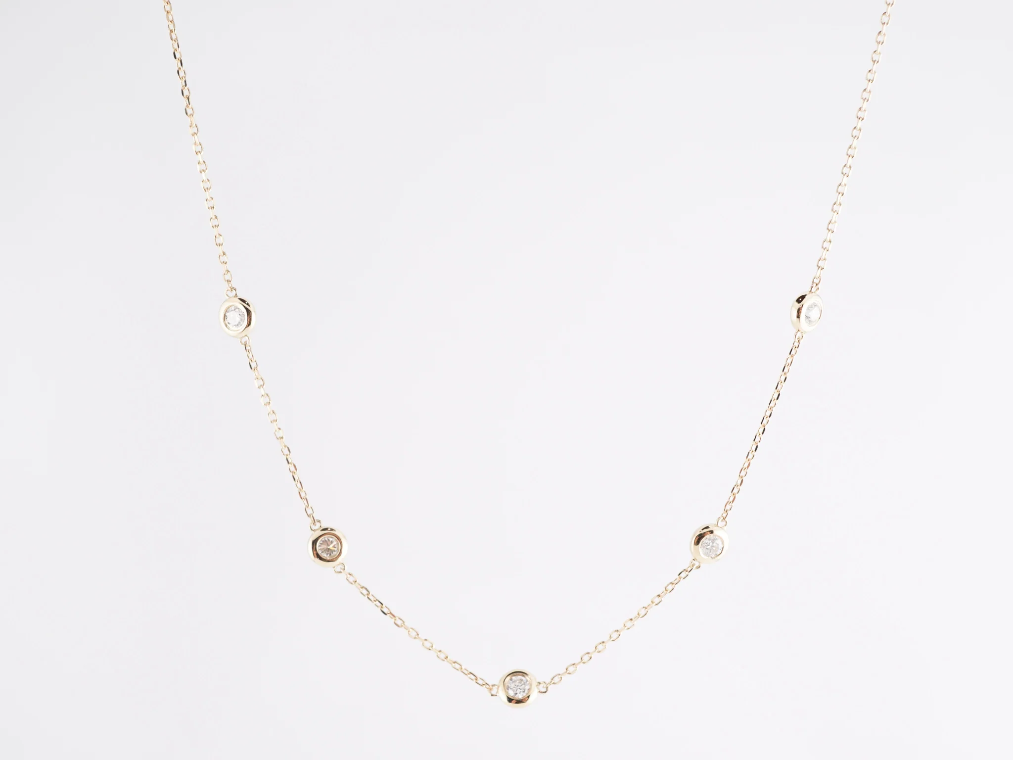 .30 Diamond Bezel Set Necklace in 14K Yellow Gold