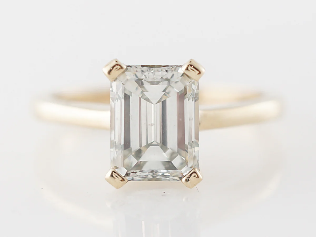 Emerald Cut Diamond Engagement Ring in Yellow Gold