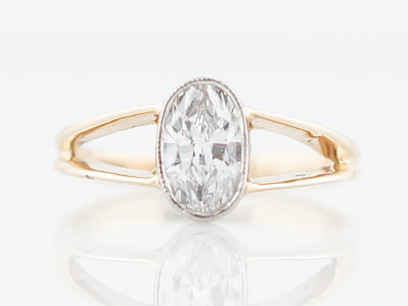 Engagement Ring Modern .63 Oval Cut Diamond in 14K Yellow Gold & Platinum