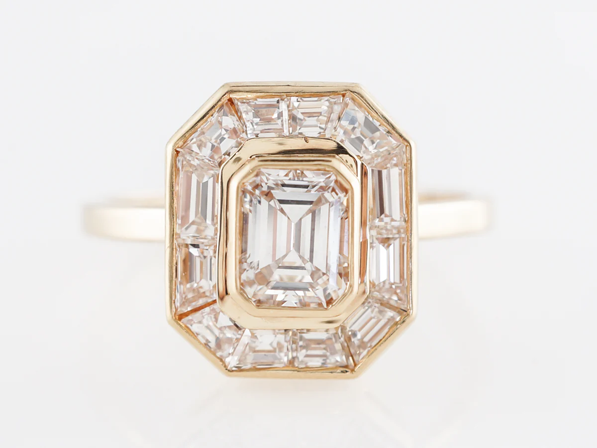 Halo Emerald Cut Diamond Engagement Ring in Yellow Gold