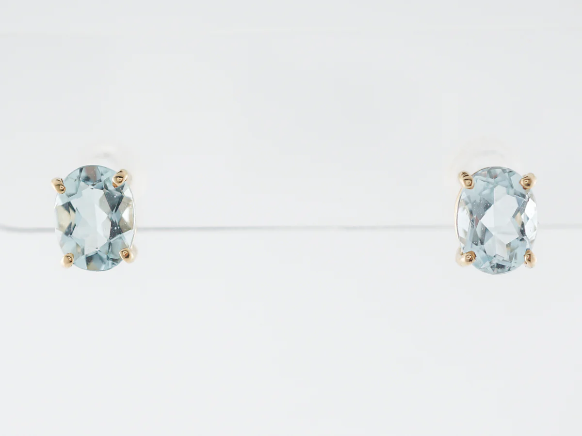 Oval Aquamarine Stud Earrings in 14k Yellow Gold