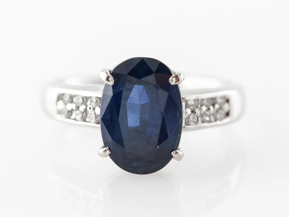Oval Sapphire & Diamond Engagement Ring in Platinum