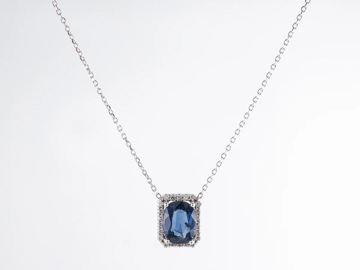 Sapphire & Diamond Halo Pendant in 14k White Gold