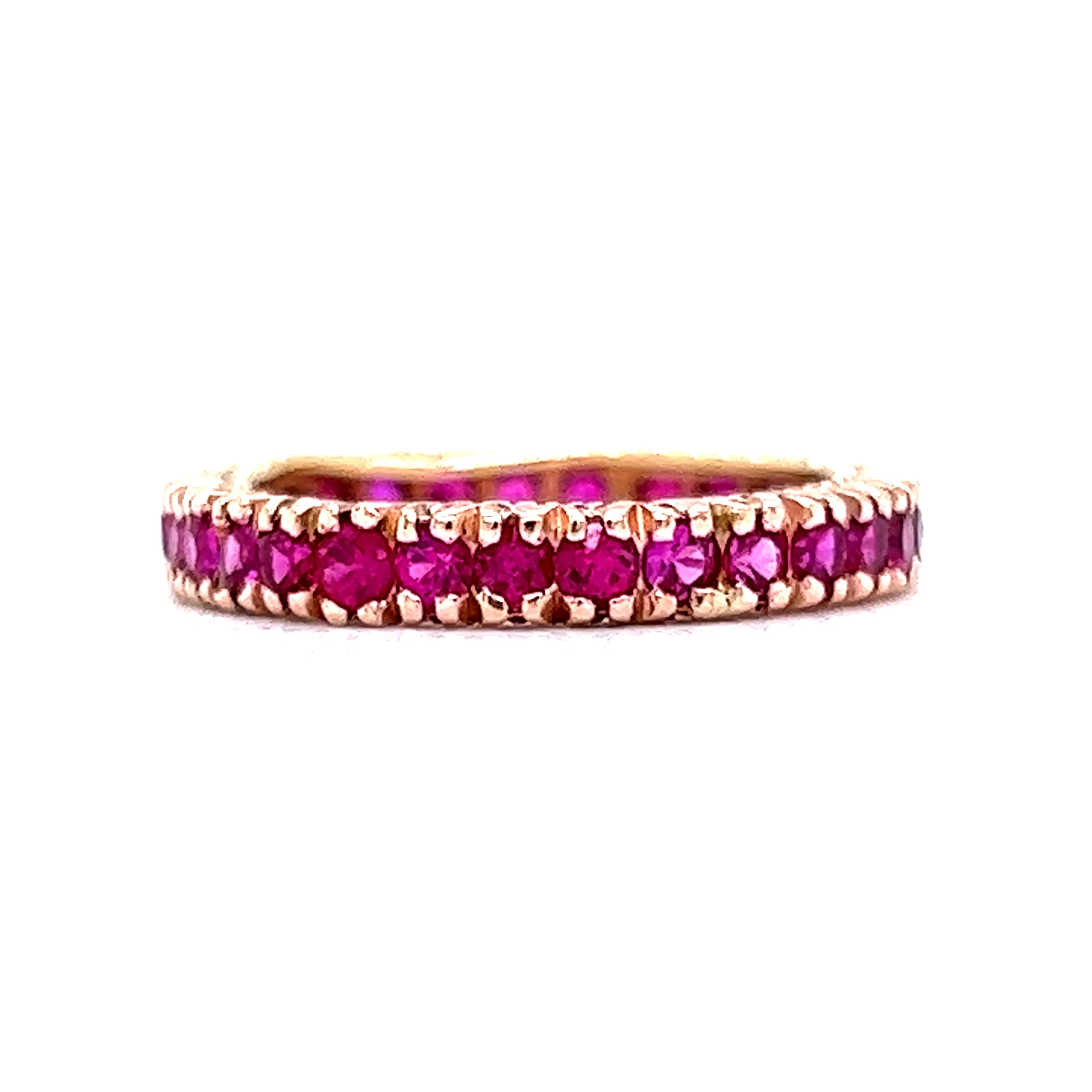 Round Cut Ruby Eternity Wedding Band in 14k Yellow Gold