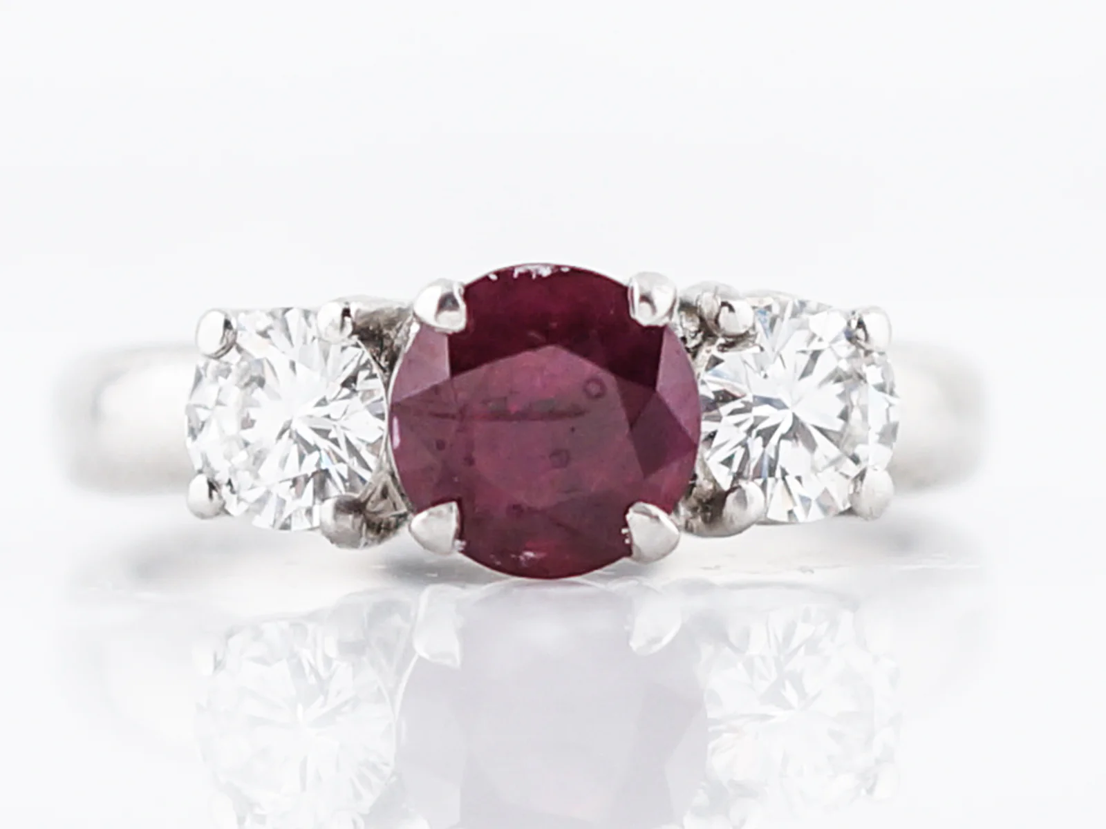 Ruby & Diamond Three Stone Engagement Ring in Platinum