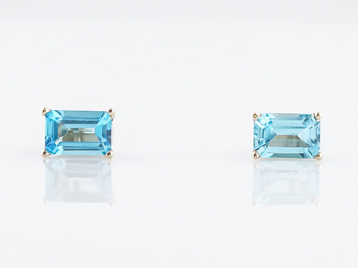Stud Earrings Modern 1.33 Emerald Cut Blue Topaz in 14k Yellow Gold
