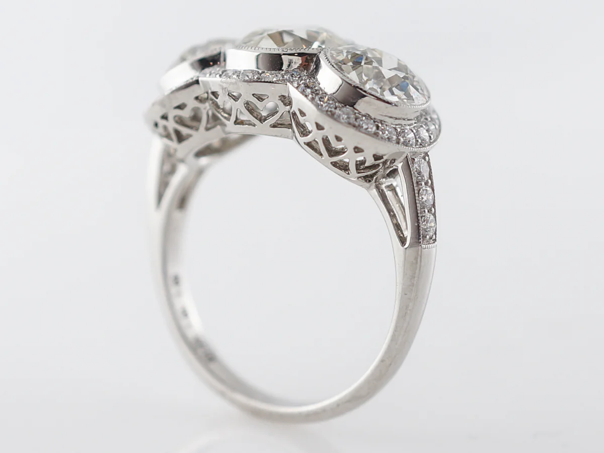 Three Stone Halo Engagement Ring in Platinum - Image 5